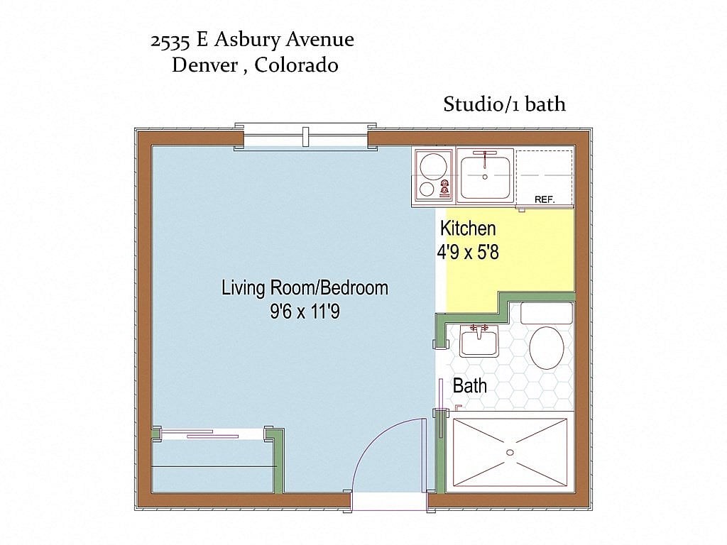 A floor plan of a studio apartment with a living room, bedroom, kitchen, and bathroom.