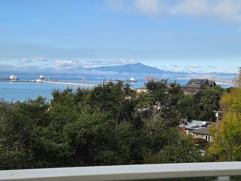 A view of a mountain from a balcony.