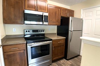 Full Kitchen with Stainless Steel Appliances at Apartments for Rent Near Sandy Springs, GA