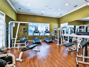 Gym with free weights at apartments near Coppell Texas