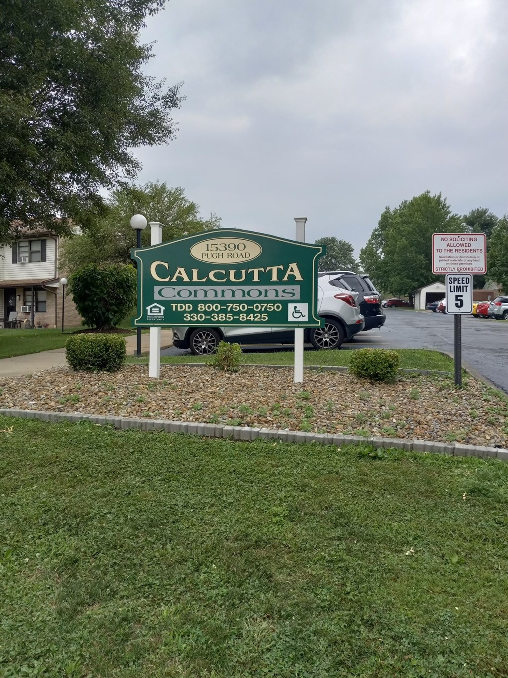 A green sign with white text that says "Calcutta" on it.