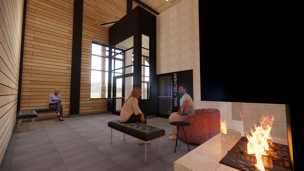 A modern living room with a fireplace and two people sitting on the couch.