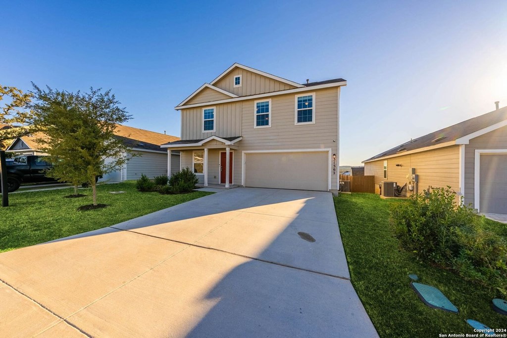 A house with a driveway in front of it.