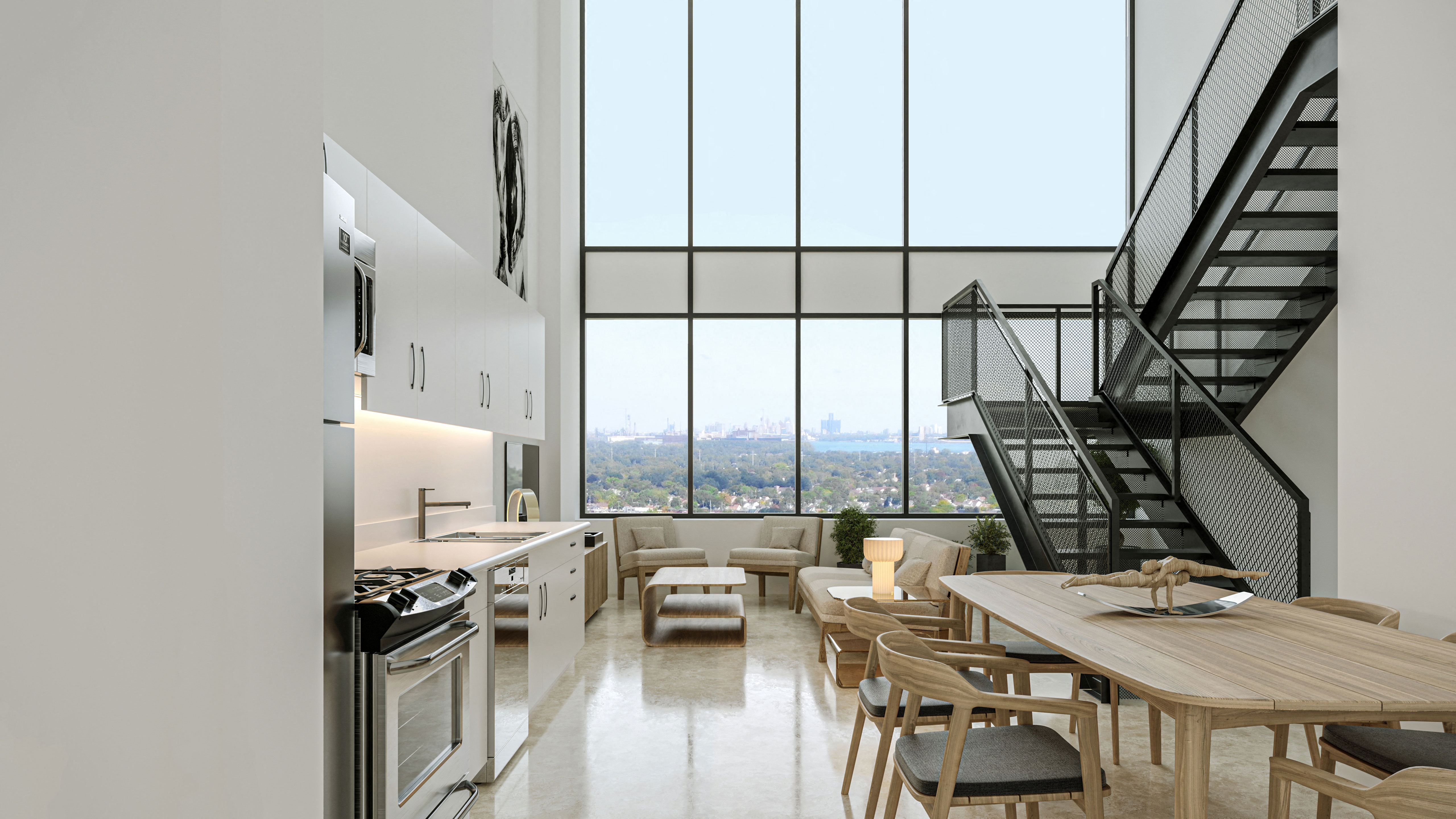 A modern kitchen with a dining table and chairs and a staircase.