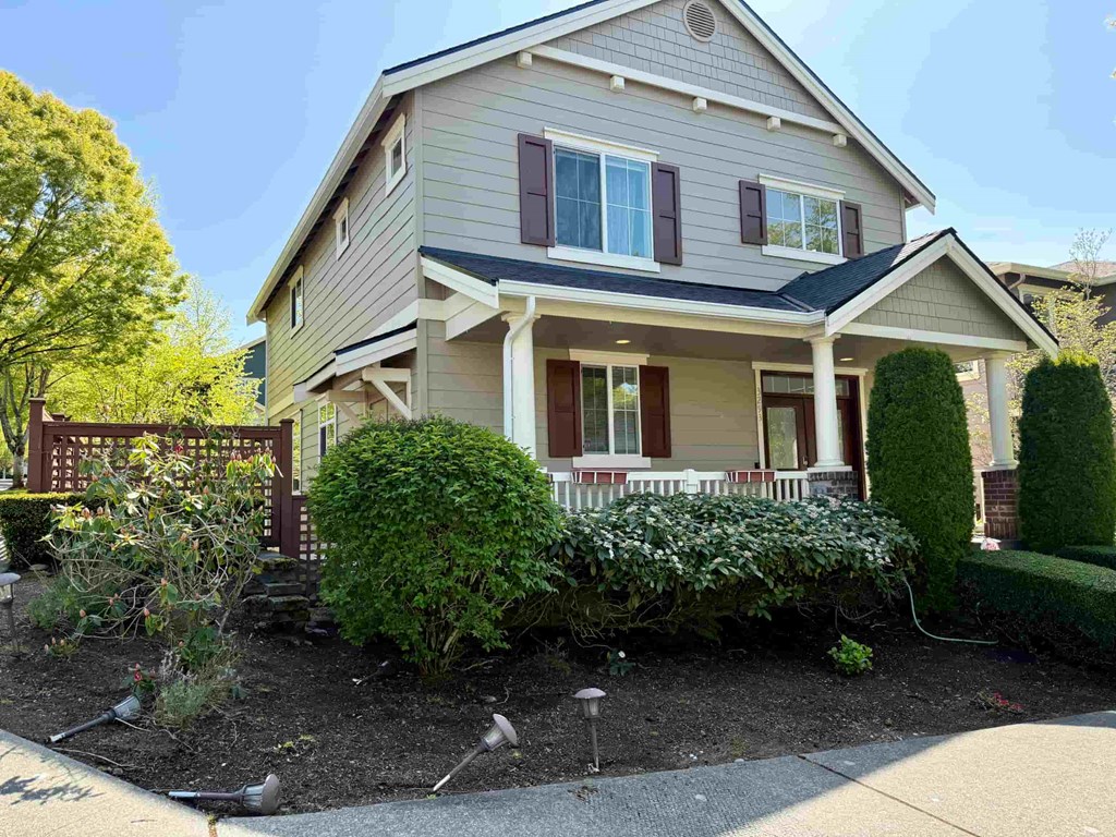 A house with a well-maintained front yard.