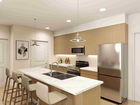 A modern kitchen with a large island and stainless steel appliances.