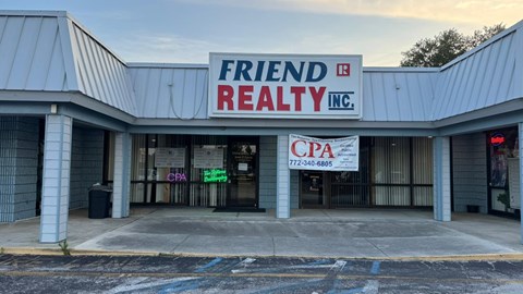 A realty company named Friend Realty Inc. with a CPA banner.