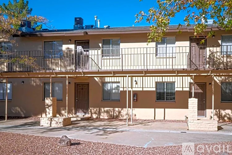 Apartment complex with a sign that says "Available".