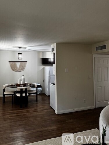 A room with a window and a filing cabinet.