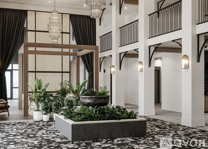 A large indoor space with a planter in the middle.