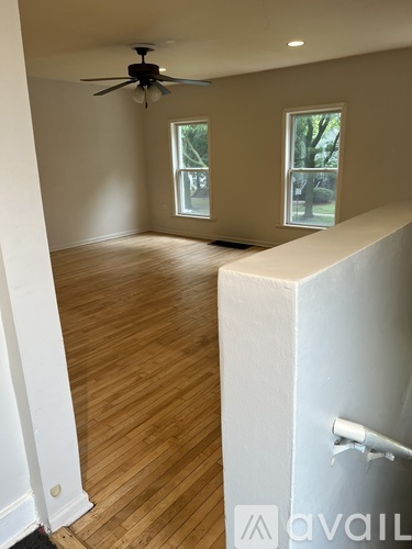 A bathroom with a toilet, sink, and bathtub.