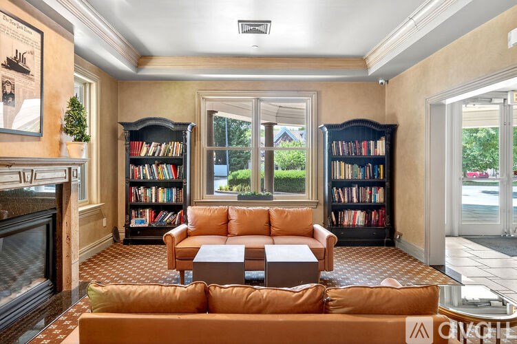 A living room with a fireplace and a couch.
