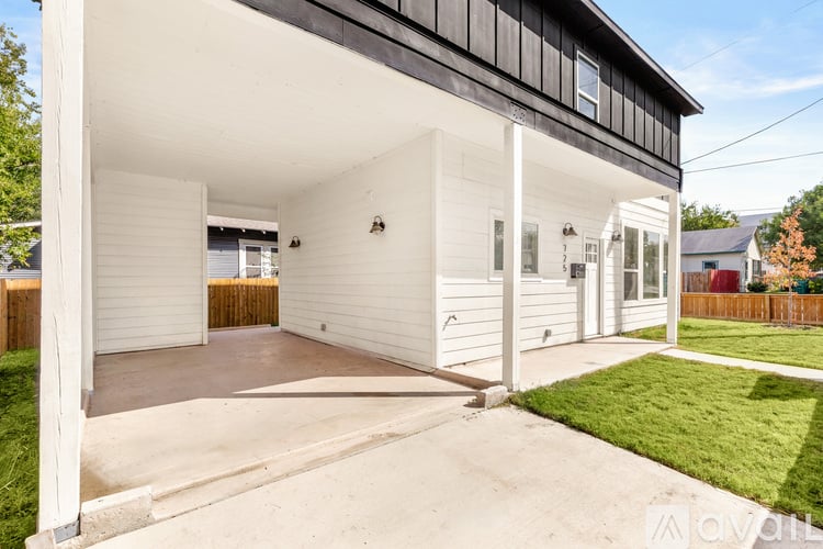 A modern house with a white garage door.
