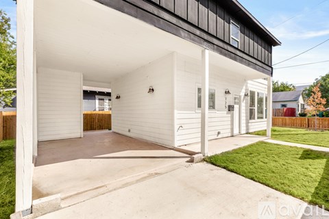 A modern house with a white garage door.