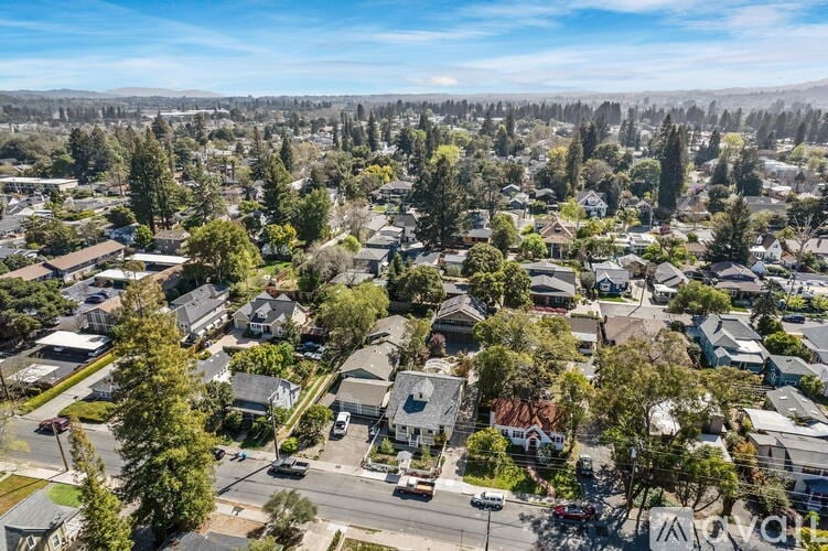 A suburban neighborhood with houses and trees.