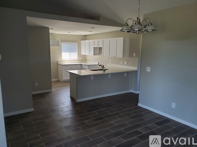 A kitchen with a large island in the middle of the room.