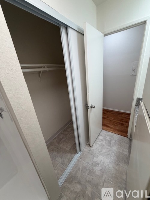 A bathroom with a toilet and a sink.