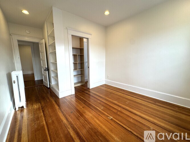 A kitchen with a table and chairs in the middle of the room.