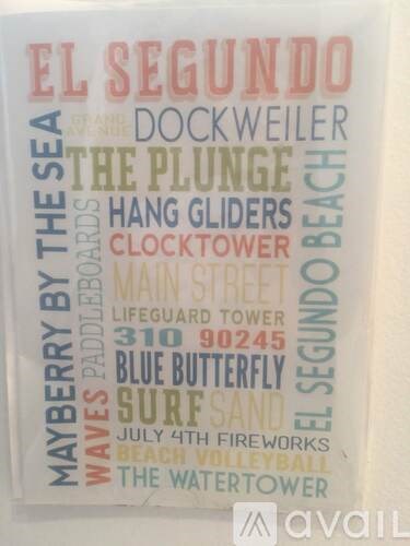 A poster with various words such as "El Segundo", "Dockweiler", "The Plunge", and others in different colors.