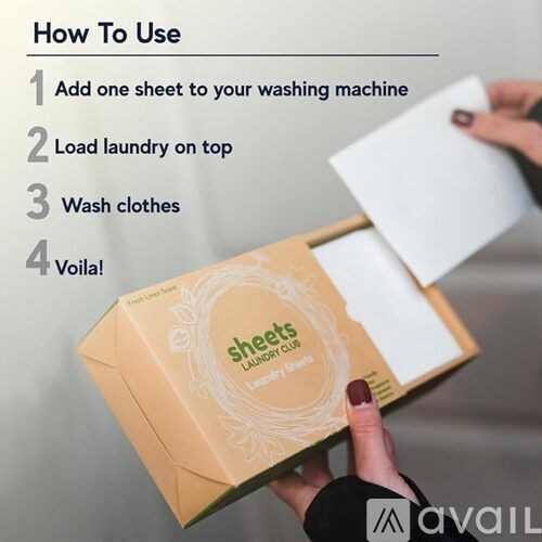 A hand holding a box of Sheets Laundry Sheets with instructions on how to use them.