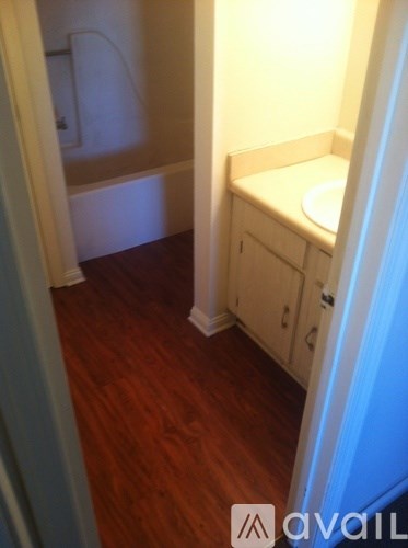 A small bathroom with a toilet and sink.