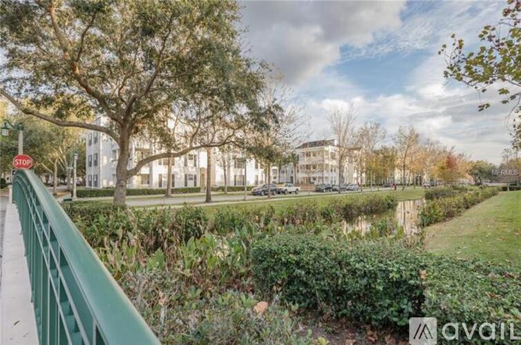 A green railing is on the left side of the image.