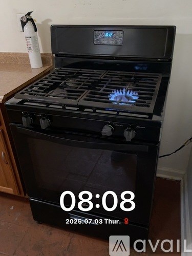A bathroom with a sink, mirror, and toilet.