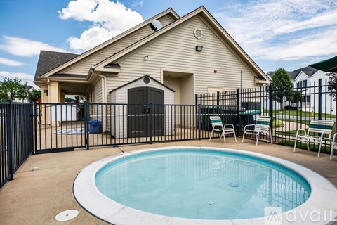 A house with a pool in the backyard.