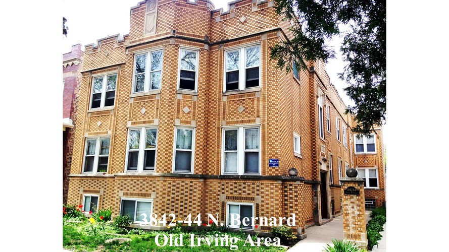 A brick building with a sign that says Old Irving Area.