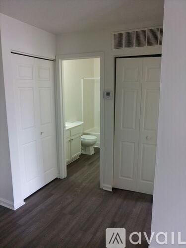 A small bathroom with a toilet and a sink.