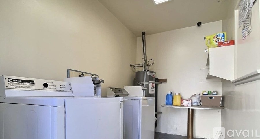 A laundry room with a washer and dryer.