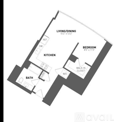 A floor plan of an apartment with a living/dining area, kitchen, bath, bedroom, and walk-in closet.