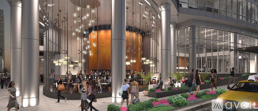 A large atrium with people walking around and a yellow car parked on the right side.