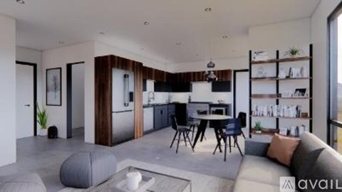 A modern living room with a grey sofa and a wooden cabinet.