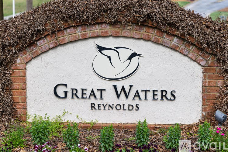A sign that says Great Waters Reynolds with a bird logo.