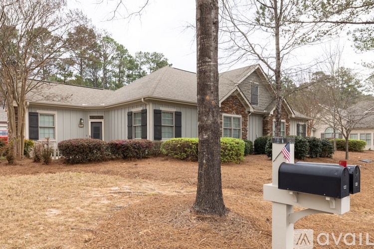 A house with a mailbox in front of it.