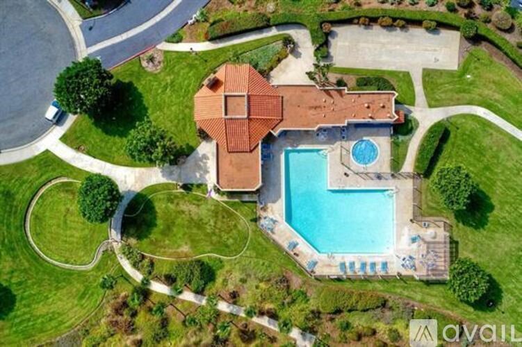 A house with a pool in the backyard.