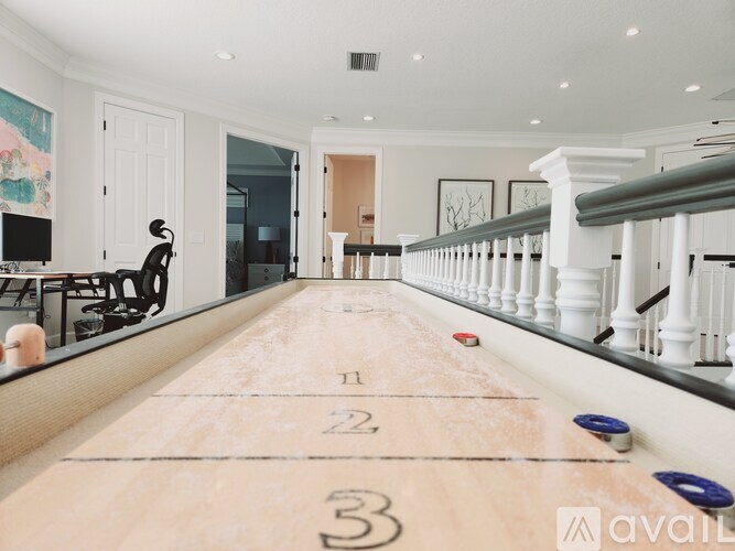 A long wooden table with numbers 1 to 3 on it.