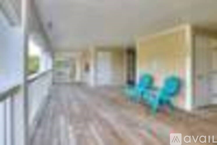 A hallway with graffiti on the wall.