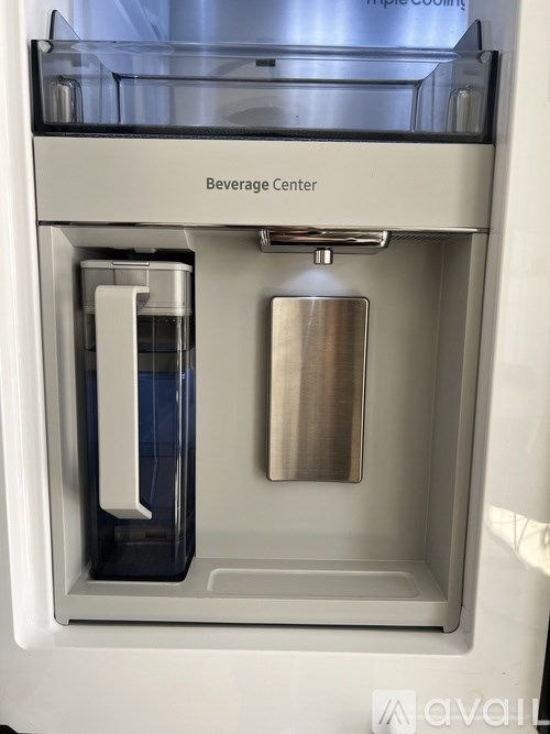 A bedroom with a bed, a ceiling fan, and a window with curtains.