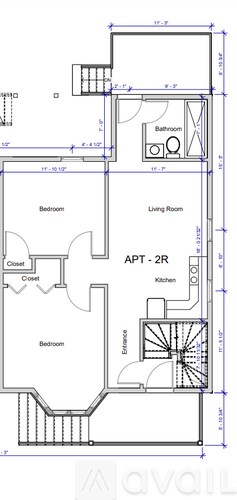 A floor plan of an apartment with a living room, bedroom, and kitchen.