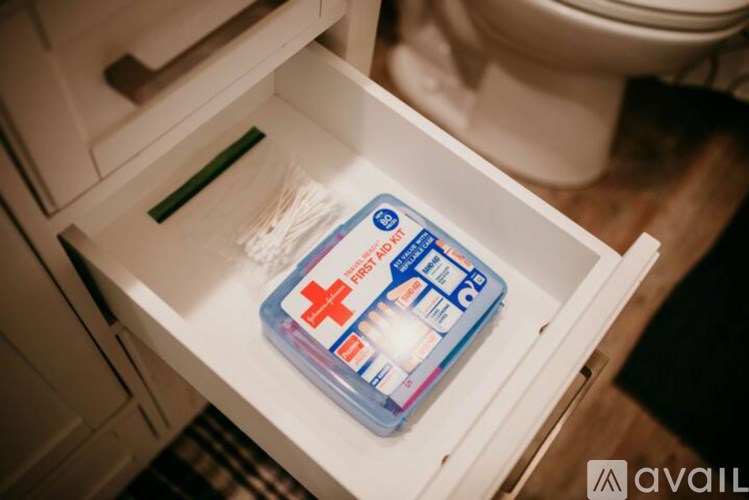 A tube of cream is in a drawer.