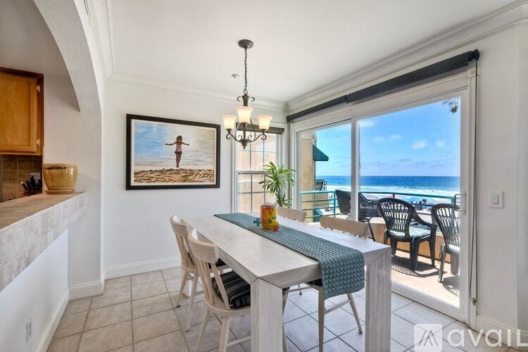 A beach scene with people enjoying the sun and sand.