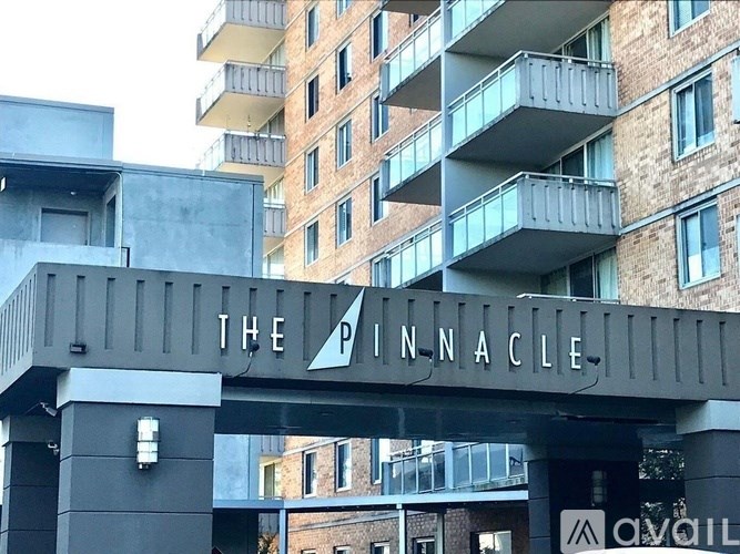 The Pinnacle apartment building with a bridge entrance.