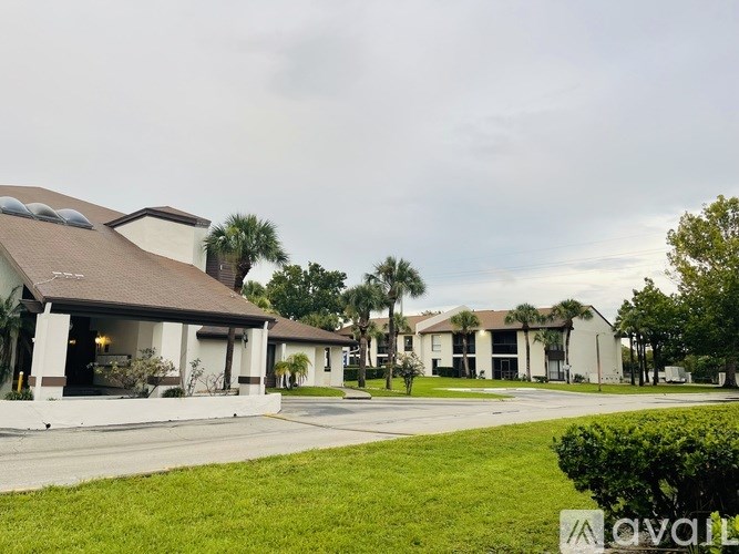 A row of houses with the word "Ovation" written on the front lawn.