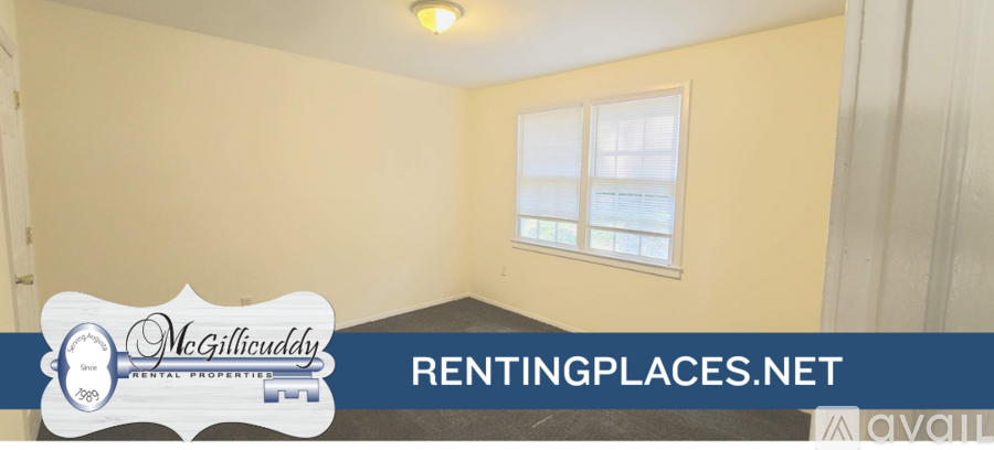 A room with a window and a shelf is available for rent.