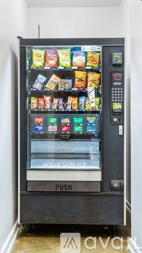 A vending machine with a variety of snacks and drinks.