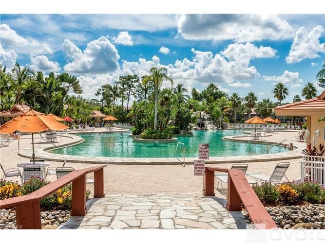 A pool area with a sign that says "No Diving".