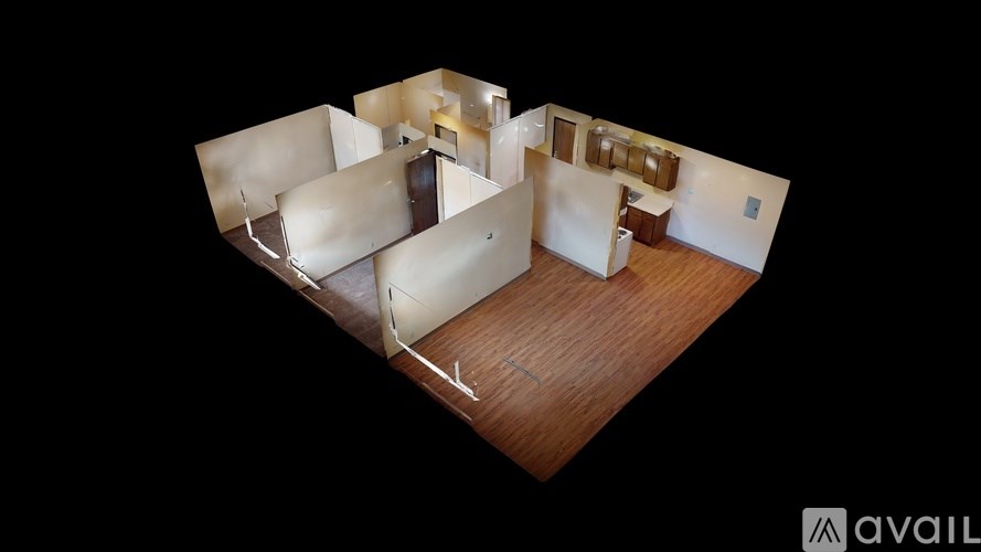 A modern house with a wooden floor and white walls.