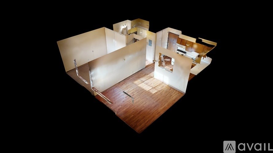 A modern house with a wooden floor and white walls.